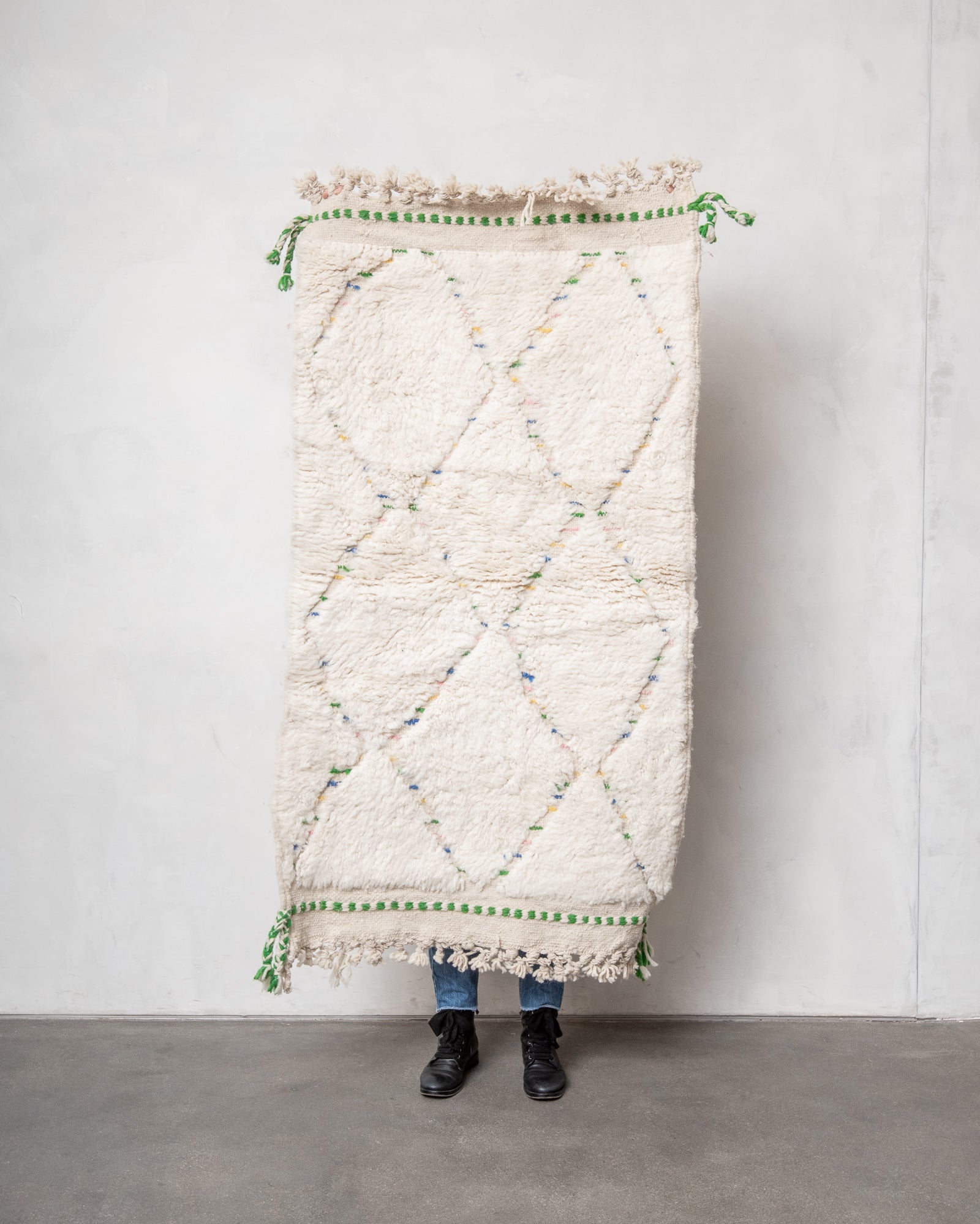 Modern, designer, handcrafted Berber rug from Morocco. Beniourain carpet with beautiful colours and patterns and fluffy wool texture.